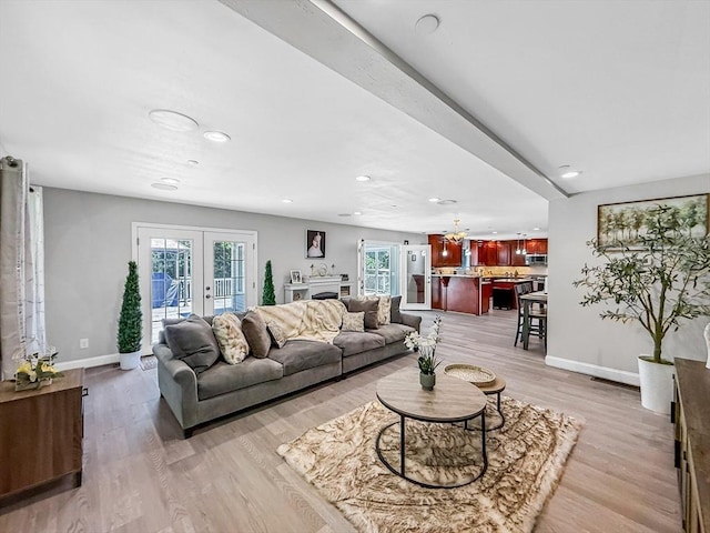 15 Stone Fence Dr, Derry, NH 03038 - living room featuring recessed lighting, light wood finished floors, a chandelier, and french doors