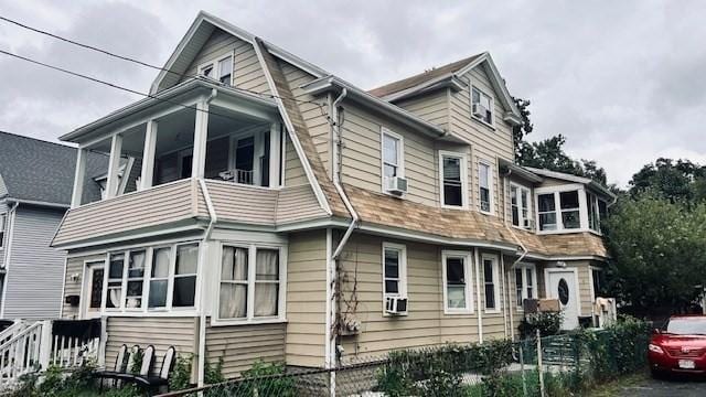 view of front of home featuring cooling unit