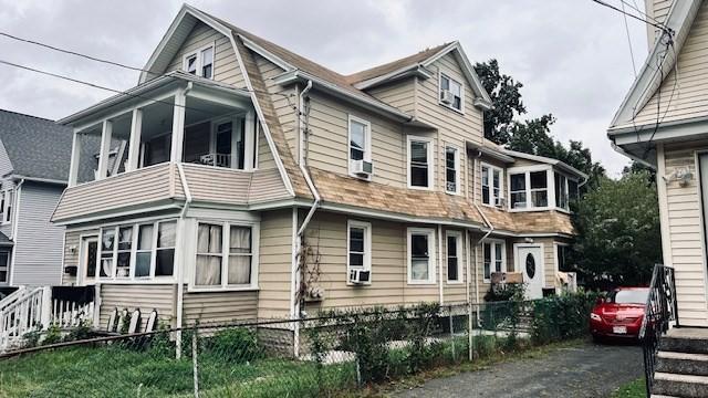 view of home's exterior featuring a sunroom