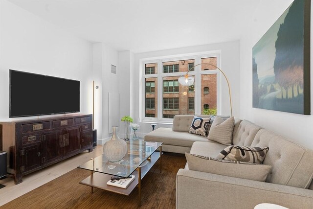 100 Lovejoy Wharf Unit 5N, Boston, MA 02114 - living room featuring visible vents and wood finished floors