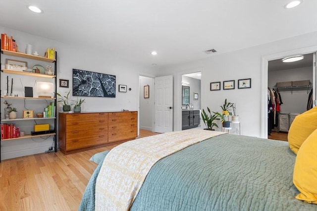 244 Prospect St, Easton, MA 02375 - bedroom featuring light wood-type flooring, recessed lighting, a spacious closet, a closet, and ensuite bathroom