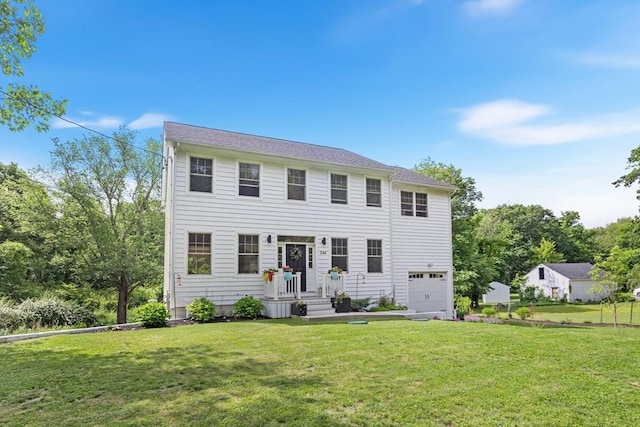 244 Prospect St, Easton, MA 02375 - colonial-style house with an attached garage and a front lawn