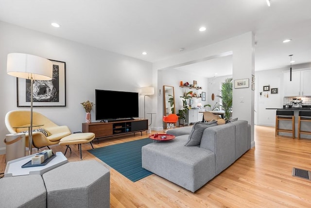 244 Prospect St, Easton, MA 02375 - living area with light wood finished floors and recessed lighting