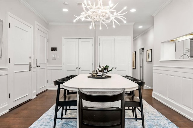 dining room with recessed lighting, dark wood-type flooring, and ornamental molding