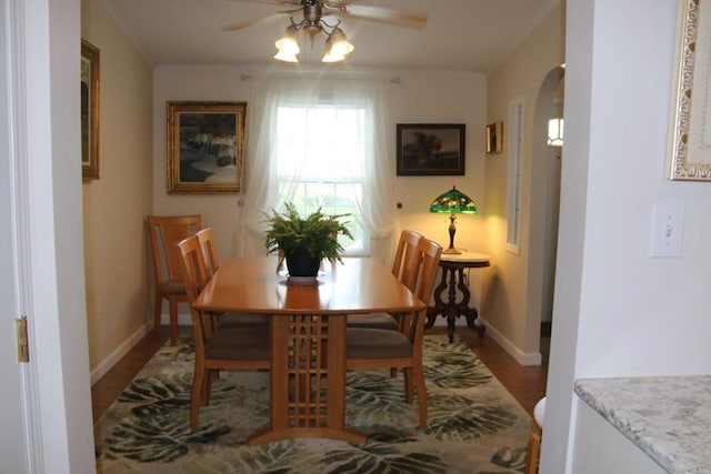 21 Deer Run, Brookfield, MA 01506 - dining room featuring arched walkways, wood finished floors, a ceiling fan, crown molding, and baseboards