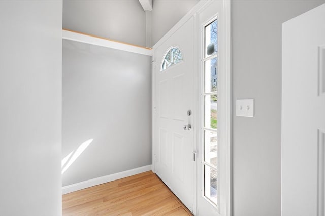 entrance foyer featuring light wood-style floors and baseboards