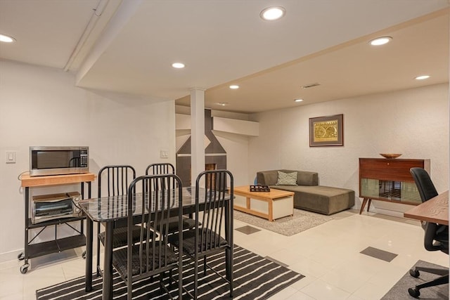 dining area featuring recessed lighting, tile patterned flooring, and baseboards