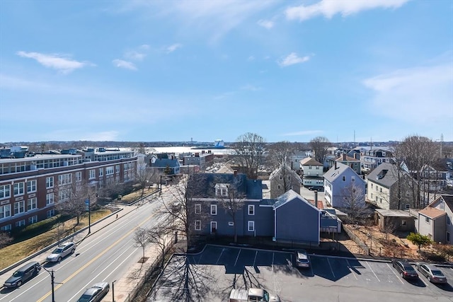 birds eye view of property with a residential view