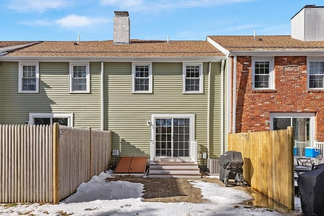 view of snow covered house