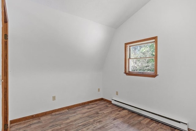 40 Lombard Rd, Hubbardston, MA 01452 - bonus room with a baseboard radiator, lofted ceiling, wood finished floors, and baseboards