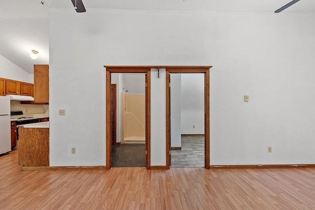 40 Lombard Rd, Hubbardston, MA 01452 - empty room with light wood-style floors, a ceiling fan, and baseboards