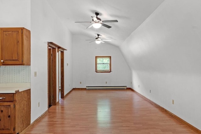 40 Lombard Rd, Hubbardston, MA 01452 - bonus room with a ceiling fan, light wood-style floors, vaulted ceiling, and a baseboard heating unit