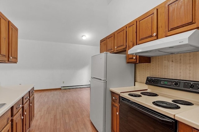 40 Lombard Rd, Hubbardston, MA 01452 - kitchen with electric stove, under cabinet range hood, light countertops, a baseboard radiator, and brown cabinets