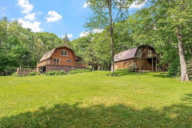 40 Lombard Rd, Hubbardston, MA 01452 - view of grassy yard with a barn, an outbuilding, and a forest view