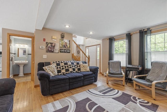 51 Carrie Ann Ln, Fitchburg, MA 01420 - living area with stairway, light wood-style flooring, plenty of natural light, and recessed lighting