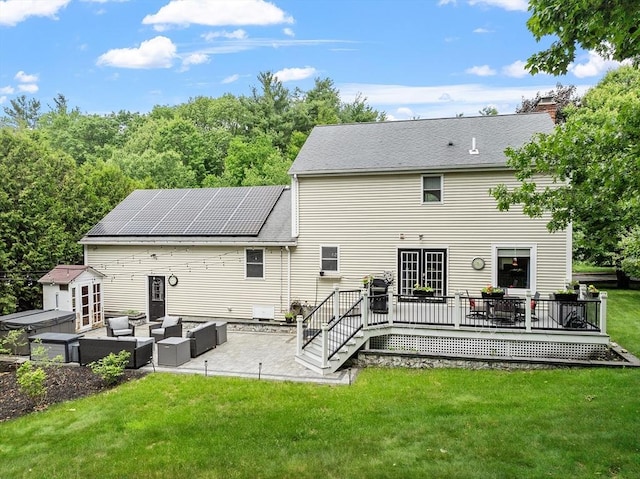 51 Carrie Ann Ln, Fitchburg, MA 01420 - rear view of house with an outdoor living space, a lawn, a wooden deck, a patio, and an outdoor structure