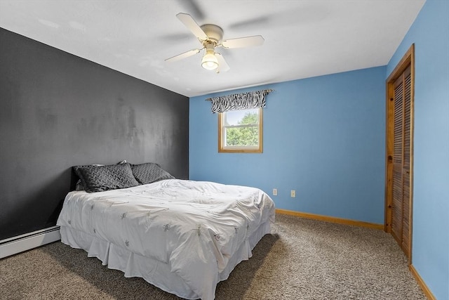51 Carrie Ann Ln, Fitchburg, MA 01420 - carpeted bedroom featuring a baseboard heating unit, ceiling fan, and a closet