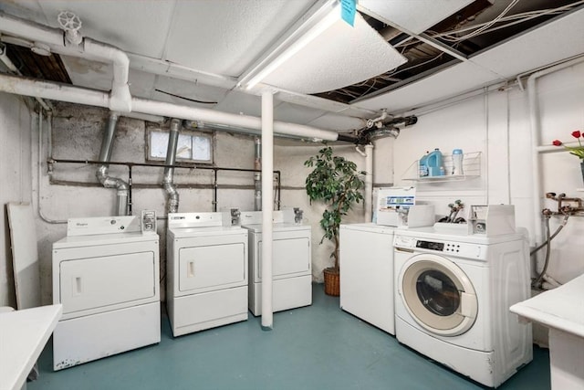 laundry room with independent washer and dryer