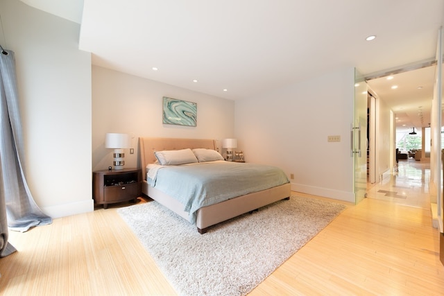 bedroom featuring hardwood / wood-style flooring