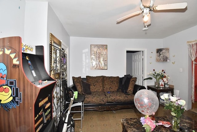 living area featuring ceiling fan