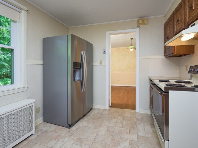 kitchen featuring stainless steel fridge with ice dispenser, radiator, tasteful backsplash, light hardwood / wood-style flooring, and white electric range oven