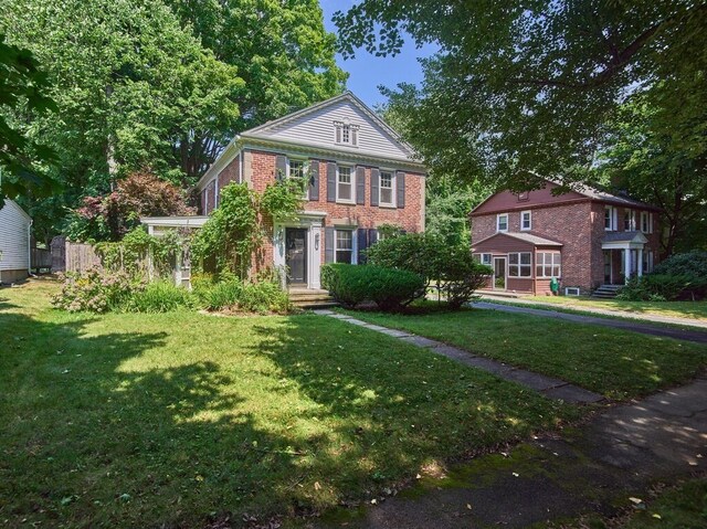 view of front facade with a front lawn