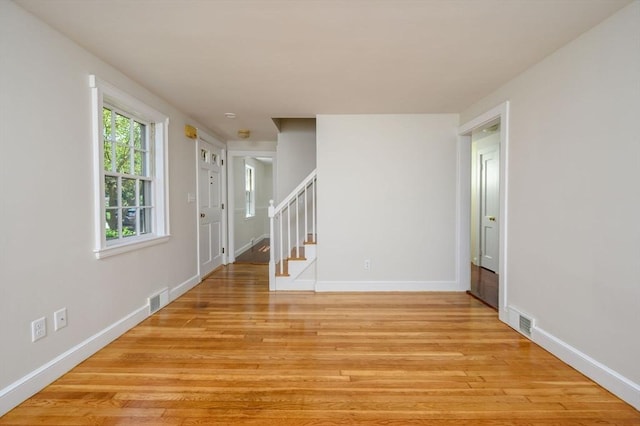 30 Huntley Rd, Hingham, MA 02043 - unfurnished room featuring light wood-type flooring and stairs