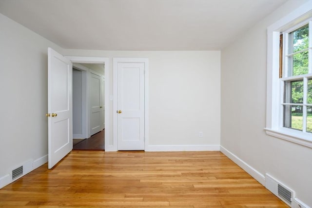 30 Huntley Rd, Hingham, MA 02043 - unfurnished bedroom with light wood finished floors and baseboards