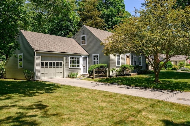 30 Huntley Rd, Hingham, MA 02043 - view of front of home with an attached garage, concrete driveway, a shingled roof, and a front yard