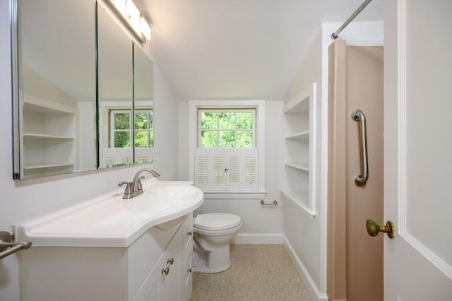 30 Huntley Rd, Hingham, MA 02043 - full bathroom with vanity, vaulted ceiling, a shower, and built in features