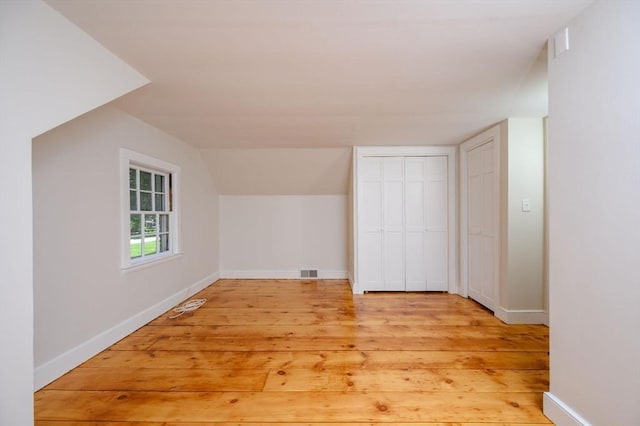 30 Huntley Rd, Hingham, MA 02043 - bonus room featuring light wood-style flooring and vaulted ceiling