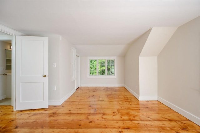 30 Huntley Rd, Hingham, MA 02043 - bonus room with light wood-type flooring and lofted ceiling