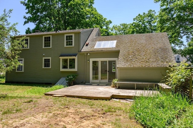 30 Huntley Rd, Hingham, MA 02043 - rear view of house with a deck and a lawn