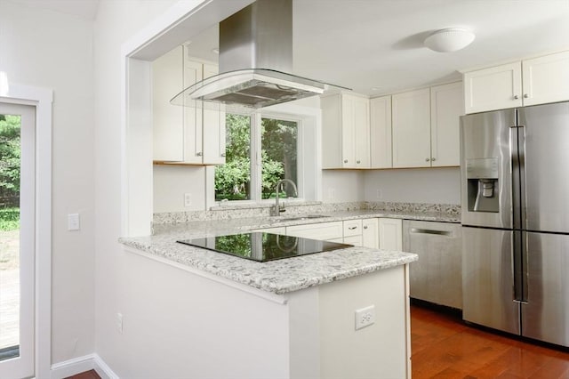 30 Huntley Rd, Hingham, MA 02043 - kitchen with stainless steel appliances, range hood, a peninsula, white cabinetry, and dark wood-style flooring
