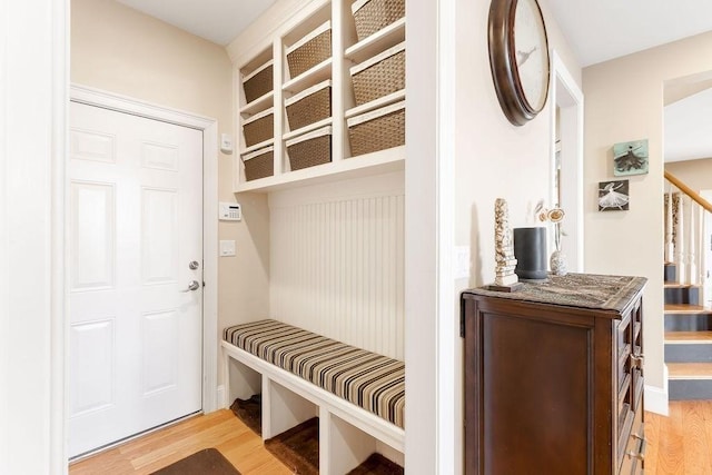 mudroom with light wood-style floors