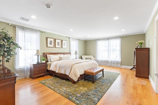 bedroom featuring ornamental molding, recessed lighting, baseboards, and light wood finished floors