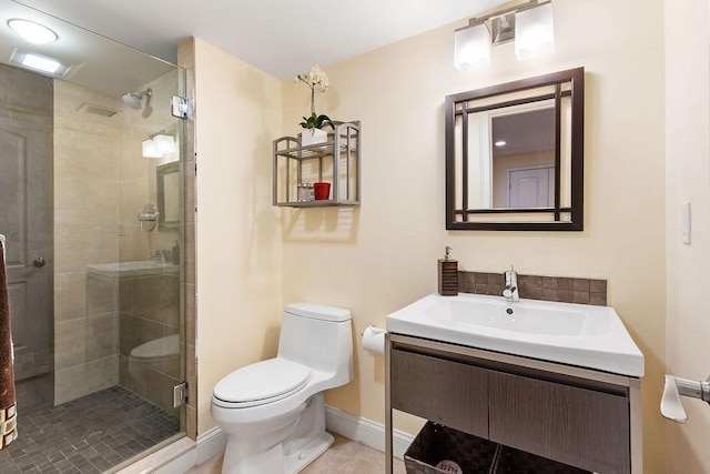 full bath featuring toilet, a stall shower, baseboards, and vanity