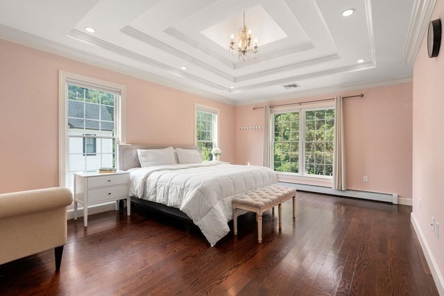 bedroom with a raised ceiling, dark wood-style floors, ornamental molding, baseboard heating, and a notable chandelier