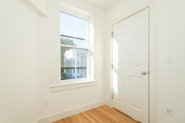 152 Pleasant St, Boston, MA 02125 - entryway with light wood-style floors and baseboards