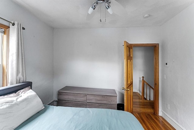 339-341 Norfolk St, Cambridge, MA 02139 - bedroom with wood finished floors, ceiling fan, and baseboards