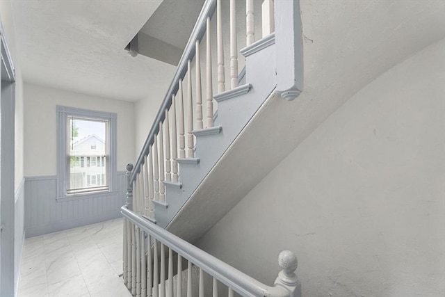 339-341 Norfolk St, Cambridge, MA 02139 - stairway featuring wainscoting and a textured ceiling