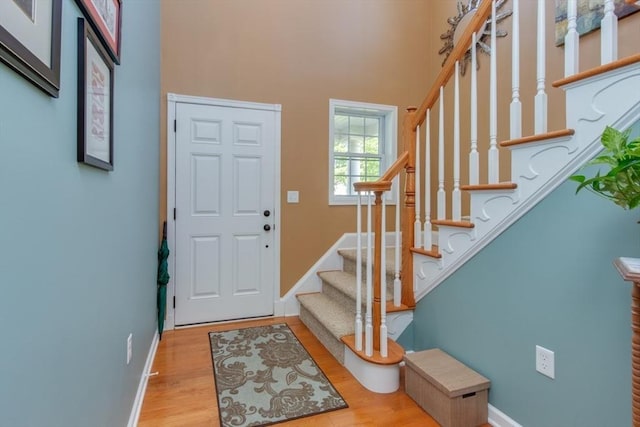 15 Herrick Dr Unit 15, Methuen, MA 01844 - foyer with wood finished floors, a towering ceiling, baseboards, and stairway