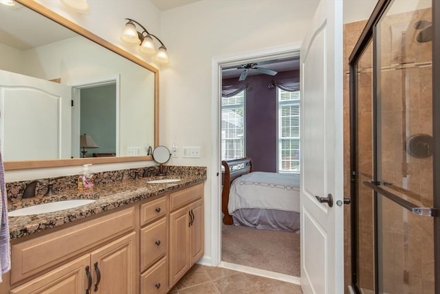 15 Herrick Dr Unit 15, Methuen, MA 01844 - bathroom with ensuite bath, double vanity, a shower stall, and tile patterned floors
