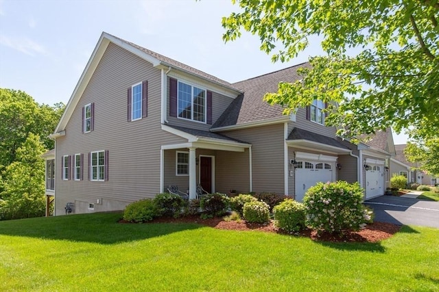 15 Herrick Dr Unit 15, Methuen, MA 01844 - view of front facade with driveway, a front yard, and a shingled roof
