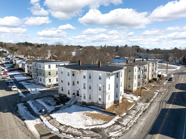 birds eye view of property with a residential view