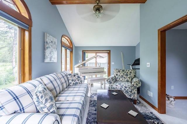 35 Dejordy Ln, Chicopee, MA 01020 - carpeted living room featuring lofted ceiling, healthy amount of natural light, a ceiling fan, and baseboards