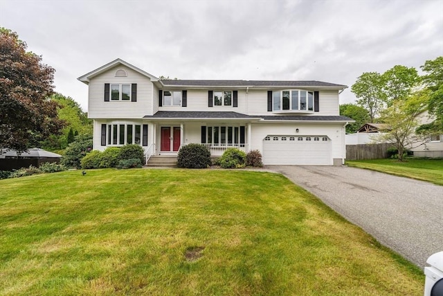 35 Dejordy Ln, Chicopee, MA 01020 - traditional home featuring a garage and driveway