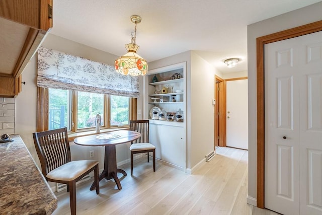 35 Dejordy Ln, Chicopee, MA 01020 - dining area featuring light wood finished floors and baseboards