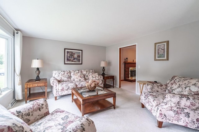 35 Dejordy Ln, Chicopee, MA 01020 - living room with healthy amount of natural light, light colored carpet, and baseboards