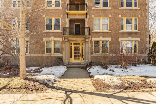 view of front of property featuring brick siding